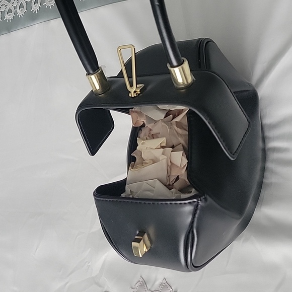 Wrist purse in black with gold closure - Picture 4 of 5